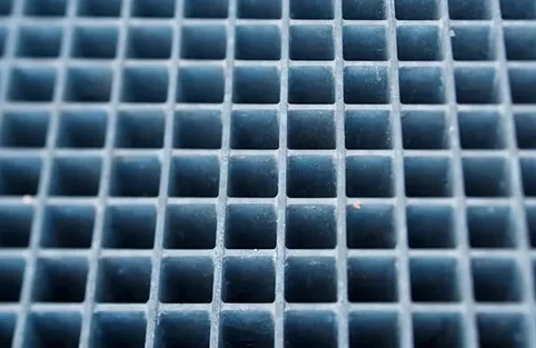 closeup photo of steel safety grate